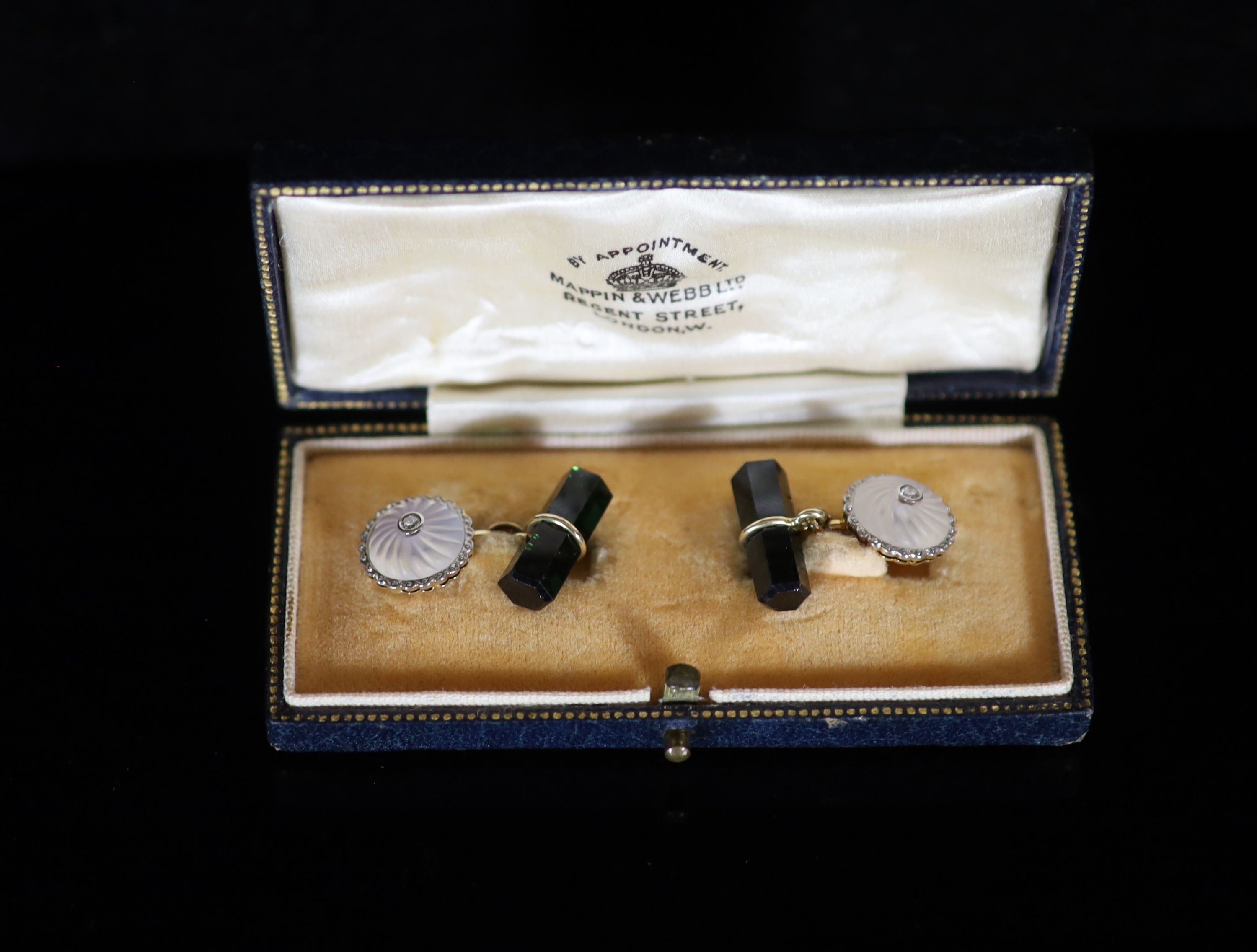 A pair of early 20th century gold, moonstone, diamond and tourmaline set cufflinks